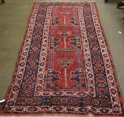 Lot 1321 - Afghan prayer rug, the field with triple Mihrab enclosed by stellar motif borders, 230cm by 114cm