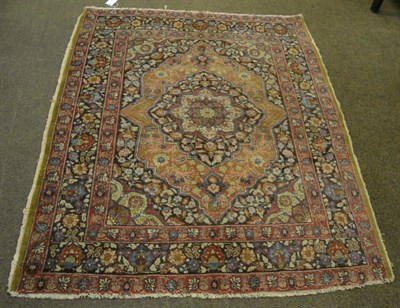 Lot 1323 - Tabriz rug, Iranian Azerbaijan, the chocolate field of floral vines around a cusped medallion...