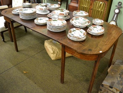 Lot 1327 - George III mahogany D-end dining table fitted with two additional leaves, a table protector and...