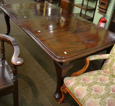 Lot 1331 - A 19th century mahogany extending dining table with two leaves