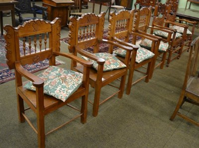 Lot 1332 - A set of six late 19th century carved oak dining chairs the two carvers bearing the date 1896