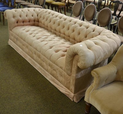 Lot 1337 - A Chesterfield sofa with pink upholstery