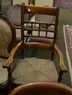 Lot 1341 - A 19th century rush seated country armchair