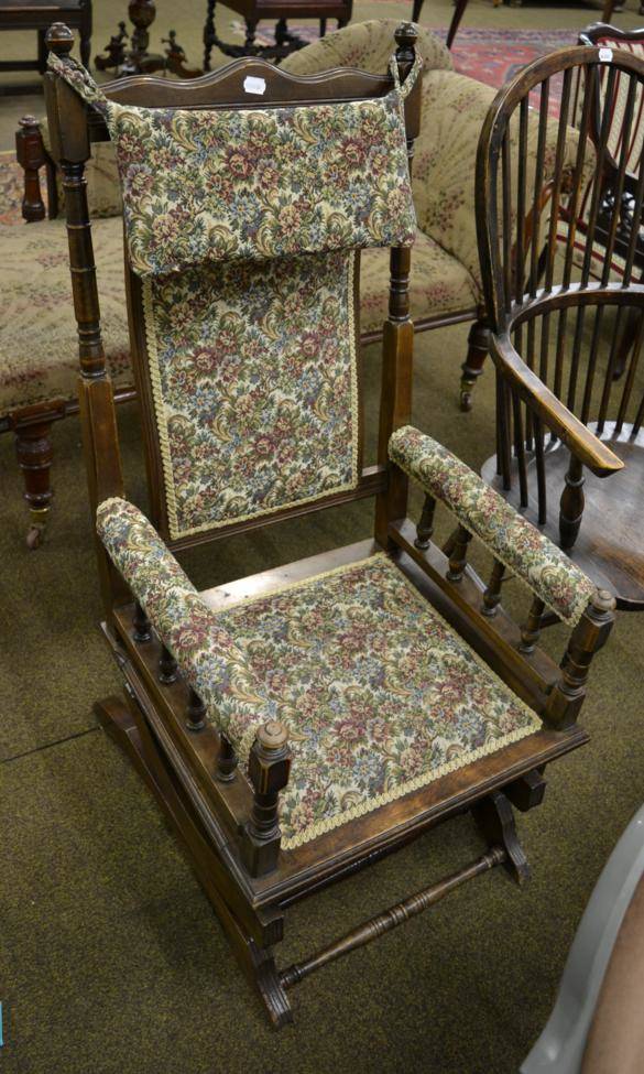 Lot 1345 A upholstered American style rocking chair