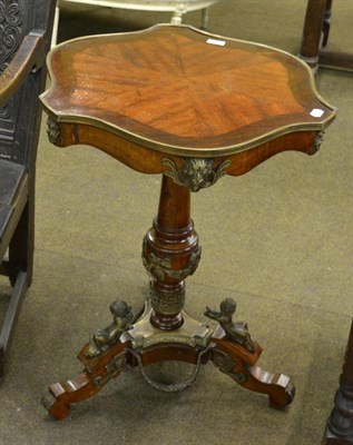 Lot 1350 - A 19th century mahogany and gilt metal mounted tripod table