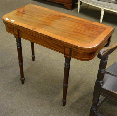 Lot 1352 - A 19th century cross banded satin wood tea table