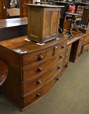 Lot 1359 - A George III mahogany bow fronted four height chest of drawers