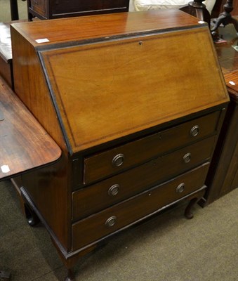 Lot 1368 - A three drawer bureau desk