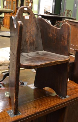 Lot 1369 - An early 20th century Arts & Crafts style chair, bearing label Dartington Hall Ltd