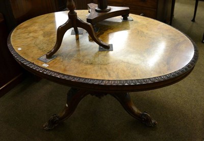 Lot 1378 - A 19th century quarter veneered walnut oval loo table (faded)