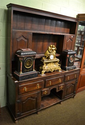 Lot 1386 - A George III provincial oak dresser and rack