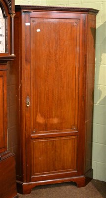 Lot 1388 - A mahogany standing corner cupboard