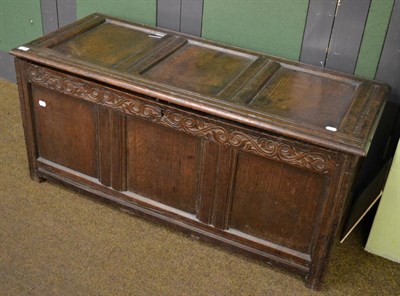 Lot 1395 - An 18th century oak three panel coffer