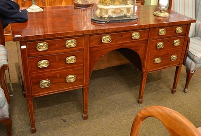 Lot 1397 - A George III mahogany sideboard