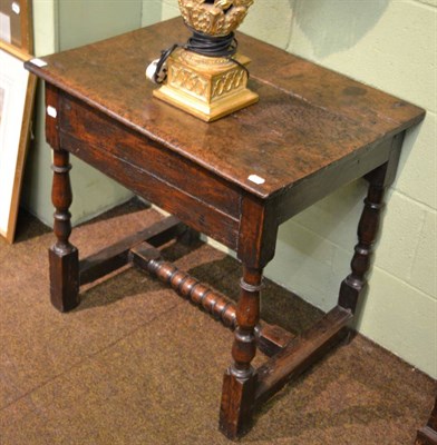 Lot 1407 - An oak side table with boldly turned stretcher, comprised of 17th and 18th century elements