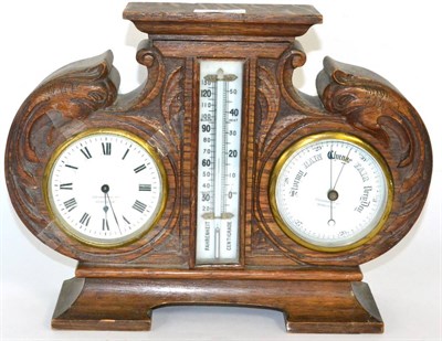 Lot 9 - A carved oak cased Compendium mantel timepiece