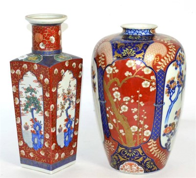 Lot 23 - A Japanese square section vase, painted with flowering trees and another Imari vase (2)