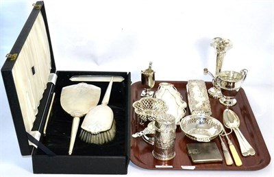 Lot 35 - A group of silver items to include a caster, cream jug, compact, George III silver spoons, Art...