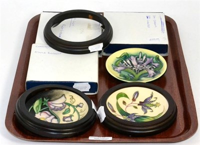Lot 36 - Three Moorcroft pottery coasters; Day Dream by Sian Leeper, Toad Lily by Philip Gibson, Isis by...