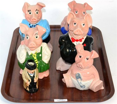 Lot 38 - A set of five Natwest pigs together with a Royal Doulton Winston Churchill miniature character...