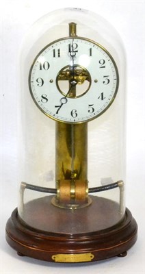 Lot 44 - An electric mantel timepiece beneath glass dome, base with plaque inscribed Nov 4th 1922