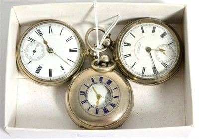 Lot 56 - A silver half hunter pocket watch and two silver open faced pocket watches (3)