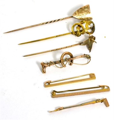 Lot 70 - A fly stick pin, two other stick pins and four brooches (7)