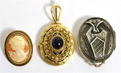 Lot 76 - An amethyst pendant, stamped '14K', a Victorian locket and a cameo (3)