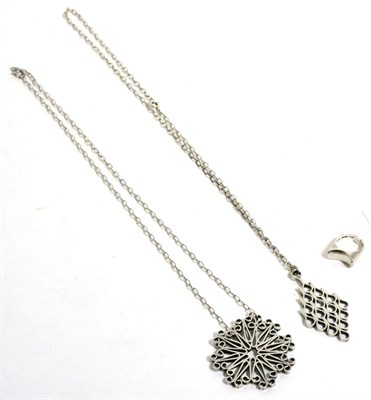 Lot 86 - Two silver necklaces and a ring (3)