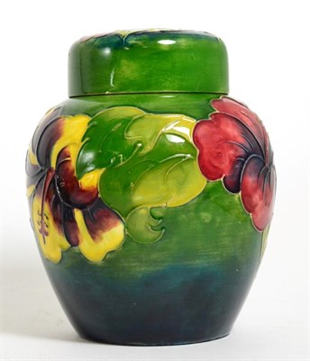 Lot 103 - A Moorcroft pottery ginger jar and cover in 'Hibiscus' pattern