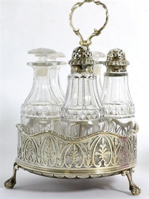 Lot 109 - A late Georgian silver cruet stand and associated cut glass bottles