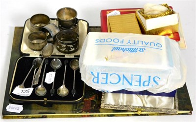 Lot 125 - A group including silver coffee bean spoons, silver napkin rings, postcards etc