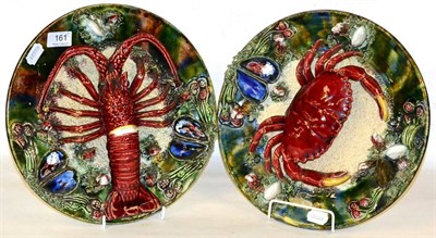 Lot 161 - Two Portuguese Palissy style wall plaques each with (almost illegible) impressed mark of Alvaro...