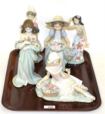 Lot 169 - Five Lladro figures including Petals of Love no. 6346, Valencian Lady no. 1304, Bountiful...