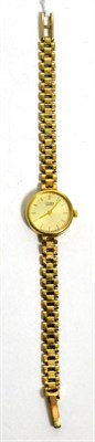 Lot 198 - A lady's 9ct gold Citizen quartz wristwatch, on a 9ct gold strap