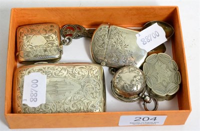 Lot 204 - Two silver vesta cases, silver cigarette case, white metal snuff box, silver sovereign holder...