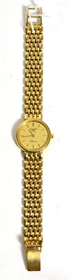 Lot 212 - A lady's 9ct gold Longines Presence quartz wrist watch, on a 9ct gold strap