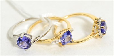 Lot 227 - A 9ct white gold tanzanite ring and two 9ct gold tanzanite and white stone rings, all finger...