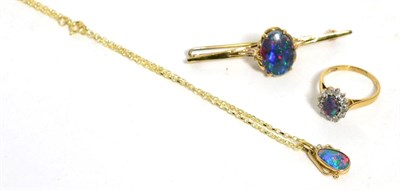 Lot 231 - A 9ct gold opal triplet and diamond pendant on chain, chain length 45cm, an opal triplet brooch and