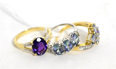 Lot 237 - A 9ct gold amethyst and white stone ring and two other 9ct gold gem set rings, all finger size P1/2