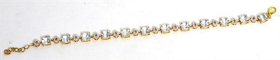 Lot 239 - A 9ct rose gold aquamarine and diamond bracelet