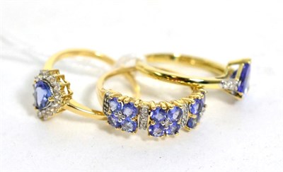 Lot 255 - Three 9ct gold tanzanite and white stone rings, all finger size P1/2 (3)