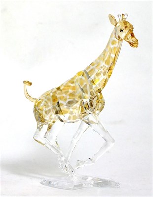 Lot 260 - Swarovski 'Desert Glow' effect giraffe no. 935896 from the 'Rare Encounters' theme group