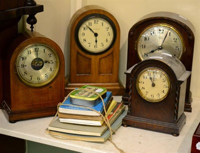 Lot 294 - Three Bulle electric timepieces and a Reid & Sons electric timepiece with seven clock books