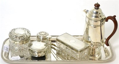 Lot 310 - A small group of silver including hot water pot, silver topped dressing table jar, plated tray etc