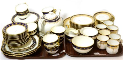 Lot 325 - Two trays of blue and gilt teawares including Copeland