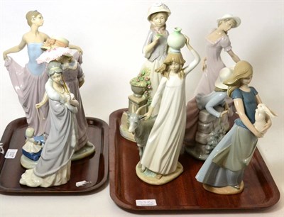 Lot 337 - Three Lladro figures together with five Nao figures