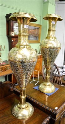 Lot 359 - A pair of modern decorative Indian brass vases of slender baluster form, 80cm high