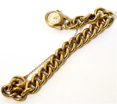 Lot 366 - A 9ct gold bracelet with a fob watch charm