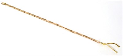 Lot 381 - A 9ct gold wishbone pendant on chain